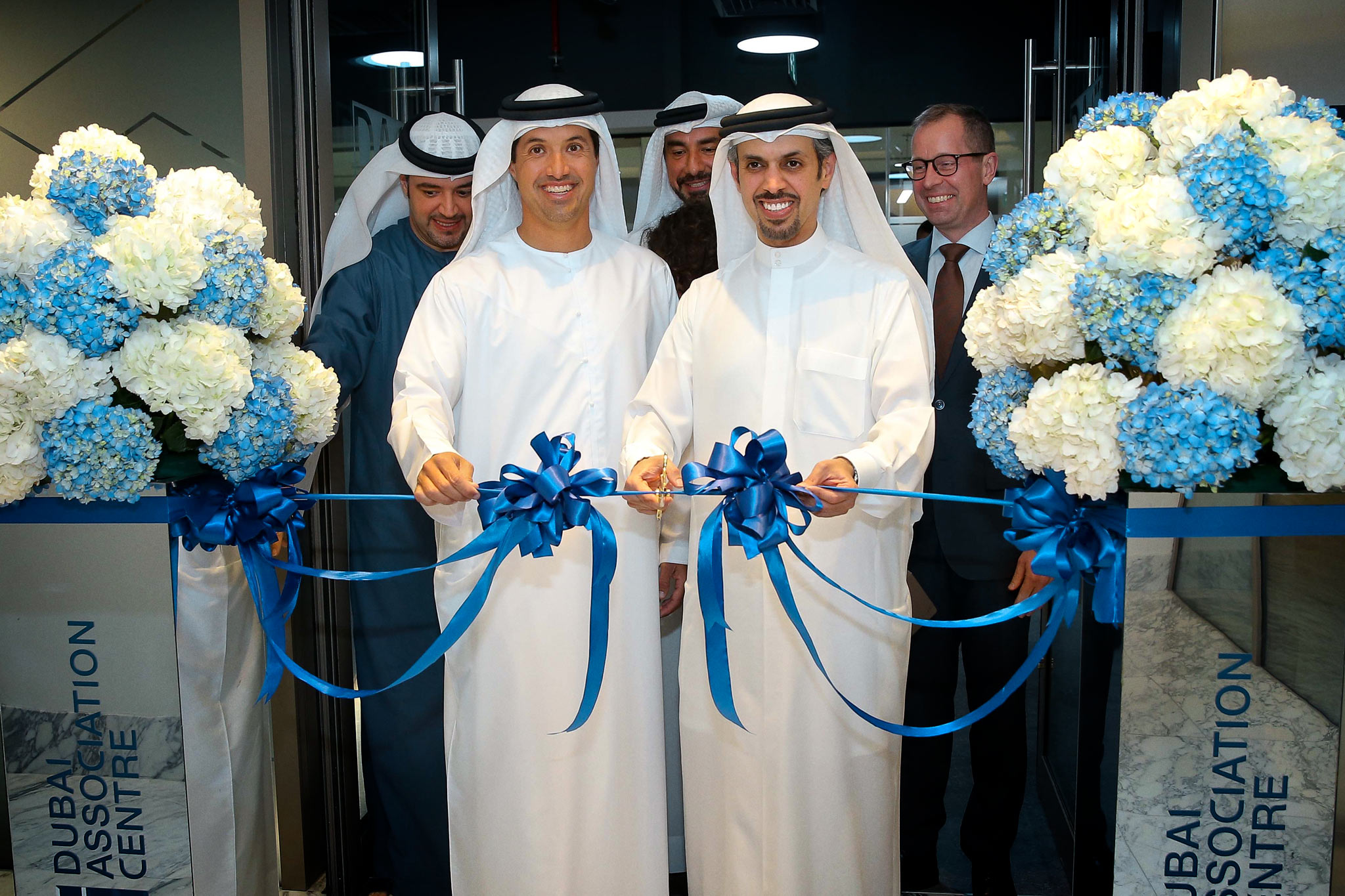 HE Helal Al Marri and HE Hamad Buamim officially open the new offices of the Dubai Association Centre