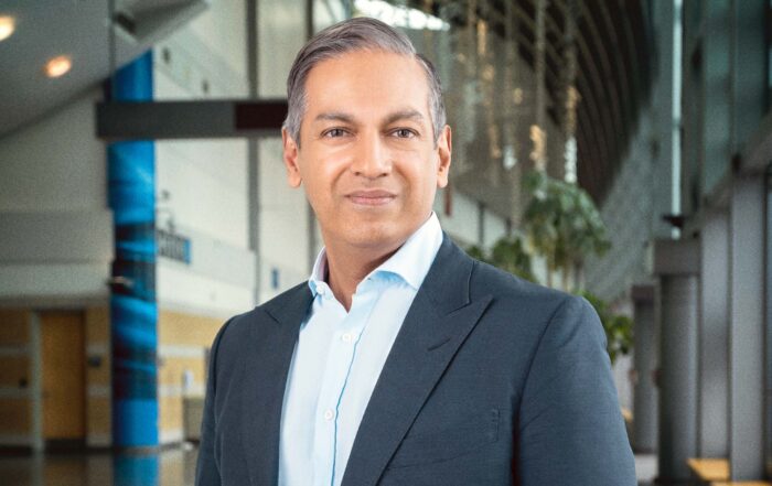 Modern interior portrait of Sherrif Karamat, CAE, President and CEO of PCMA and CEMA.